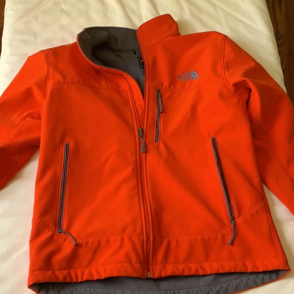 Orange north face never worn